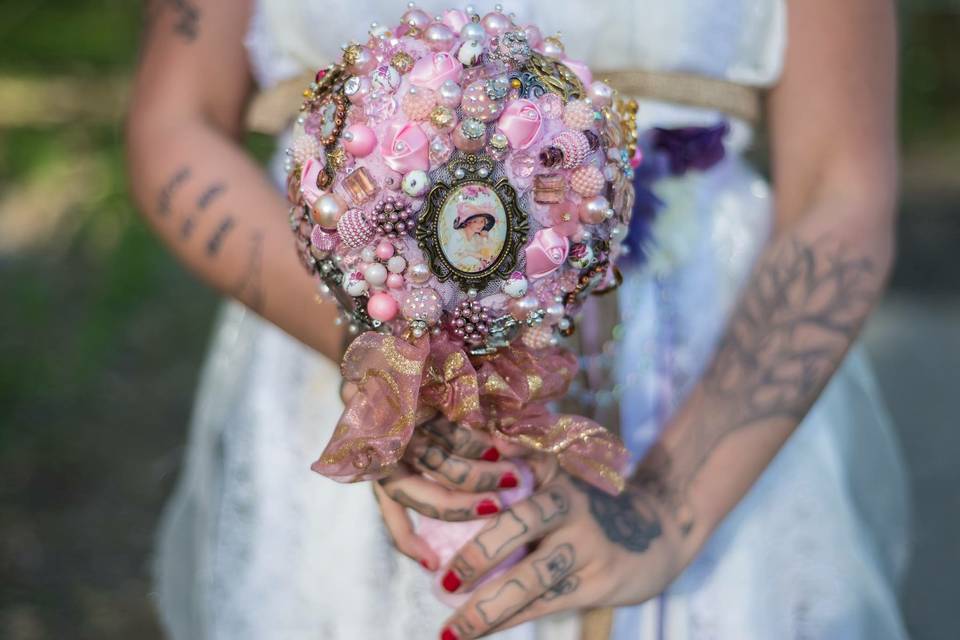 Pink brooch and bead bouquet