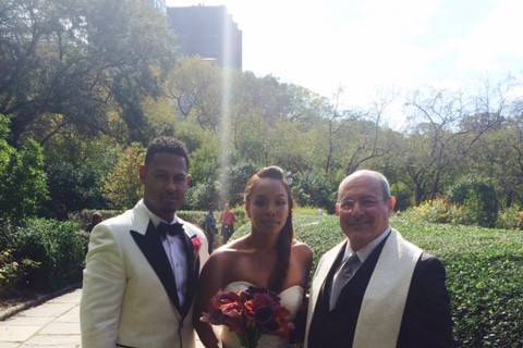 Couple with the officiant