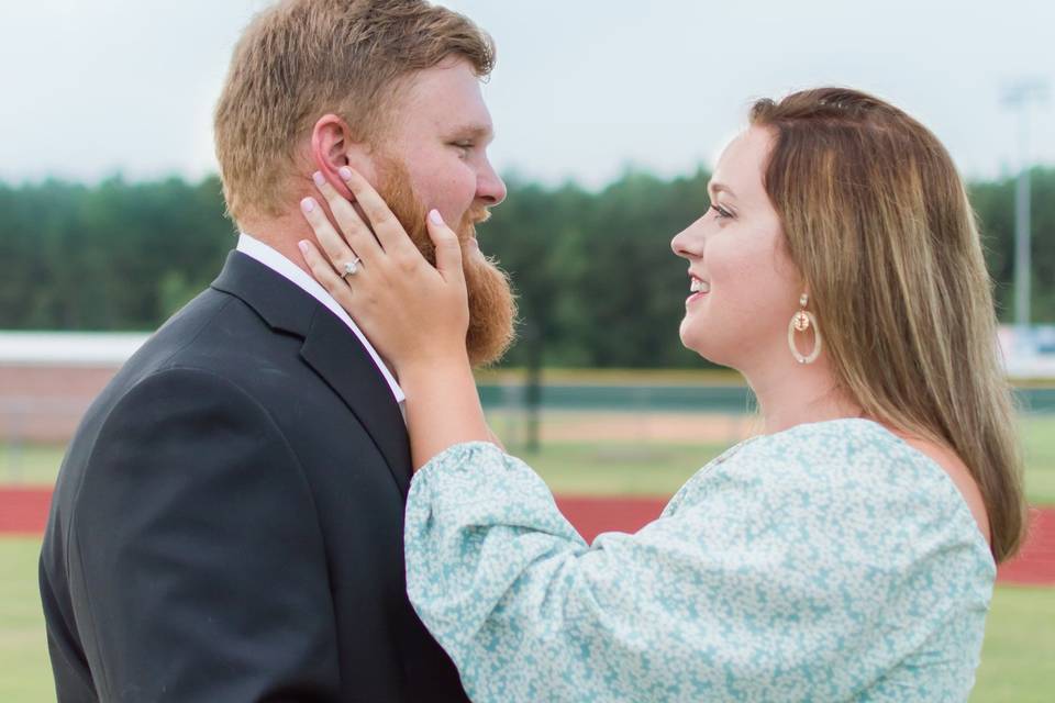 Engaged at their alma mater