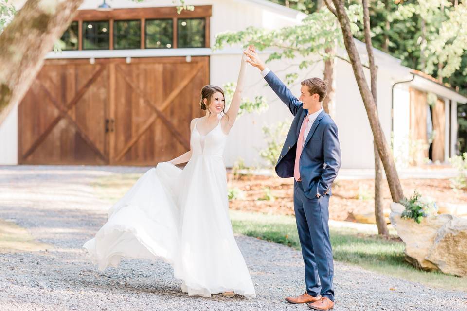 Happy couple in front of venue