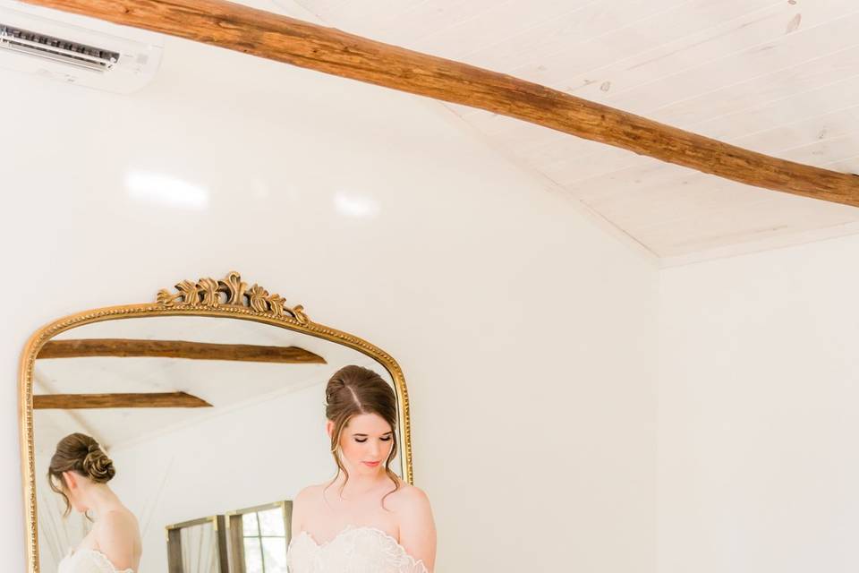 Bride in front of Grand mirror