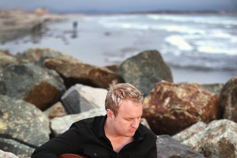 Matt playing the guitar