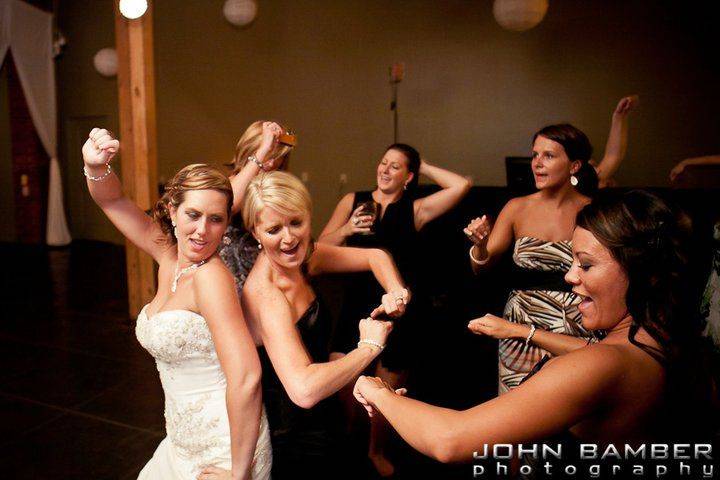 Bride and guests dancing