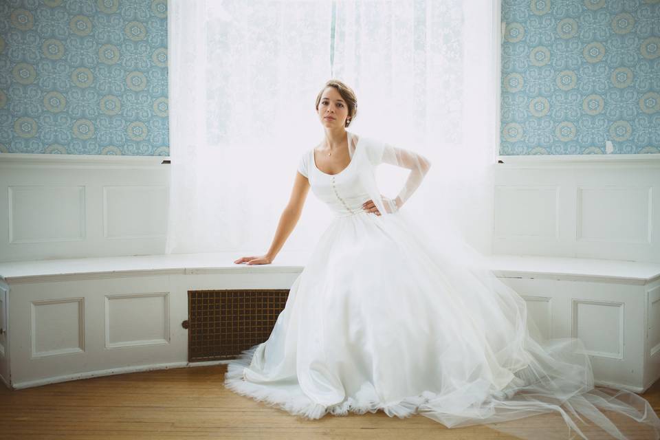 Dress in the bride's room with beautiful lighting.