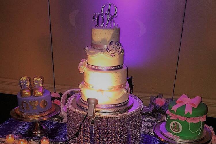 Stunning wedding cake with purple ribbons