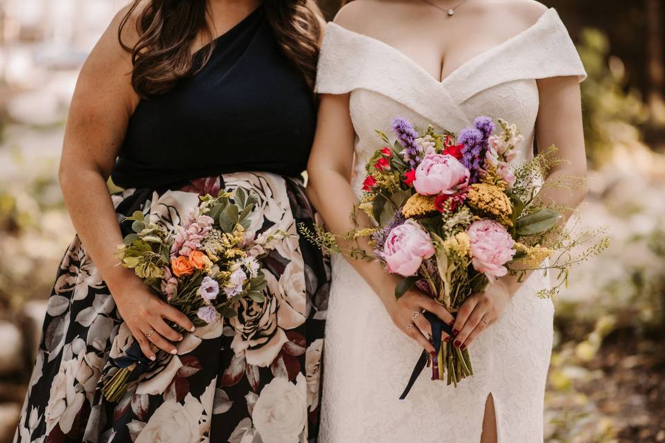 LGBTQ brides with flowers
