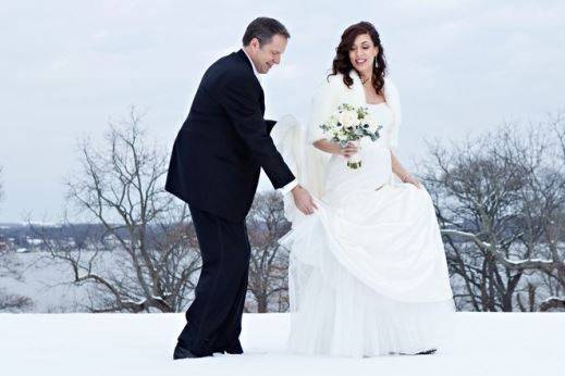 Groom and bride in the snow
