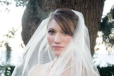 soft classic bridal look with soft smokey eyes and peachy pink cheeks