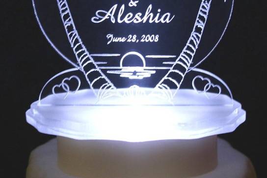 Lighted Personalized Palm Tree Sunset Cake Top.  Personalized with couples names & wedding date. Light colors available, as well as the constant color changing RGB light.  Other Sea Themes Available.