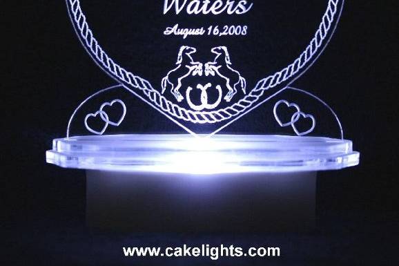 Lighted & Personalized Western Horses & Rope Cake Top.  Personalized with couples names and wedding date.  Available in colors, and the RGB color changing light.  Other western toppers available at cakelights.com