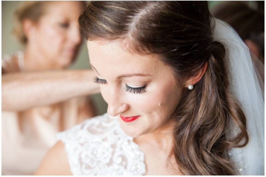 Bride getting dressed | Macon Photography