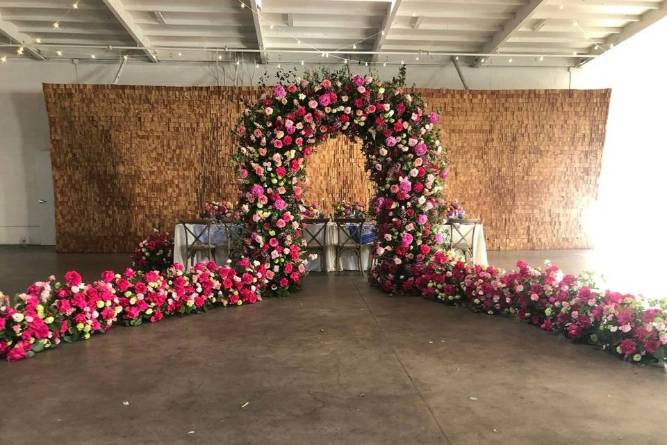 Rosy wedding arch