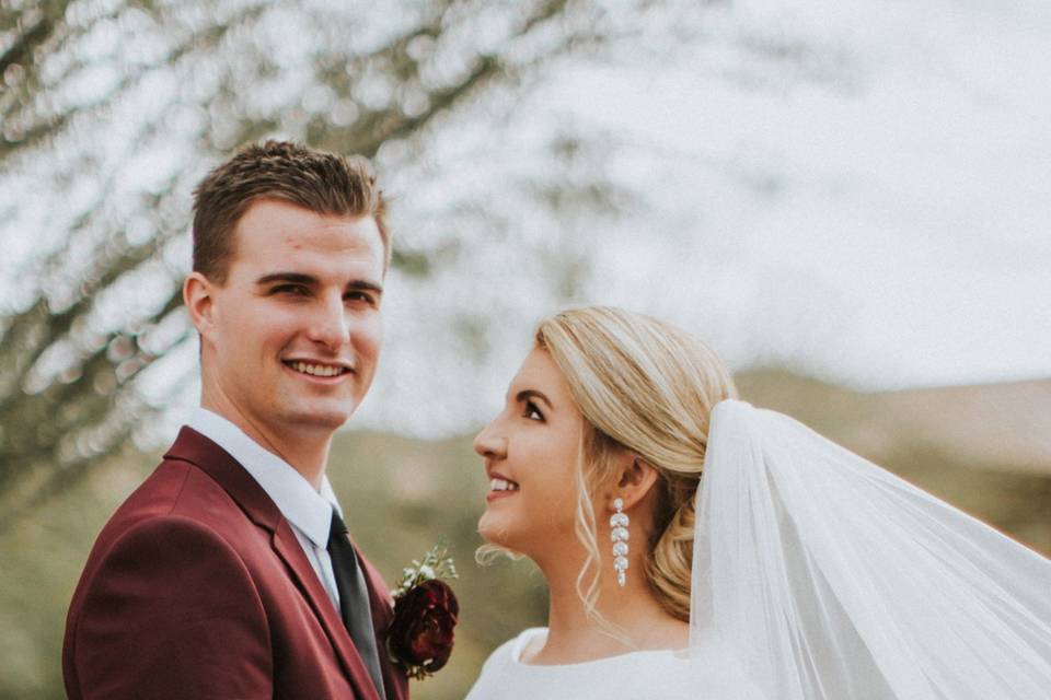 Groom and bride with wedding flowers