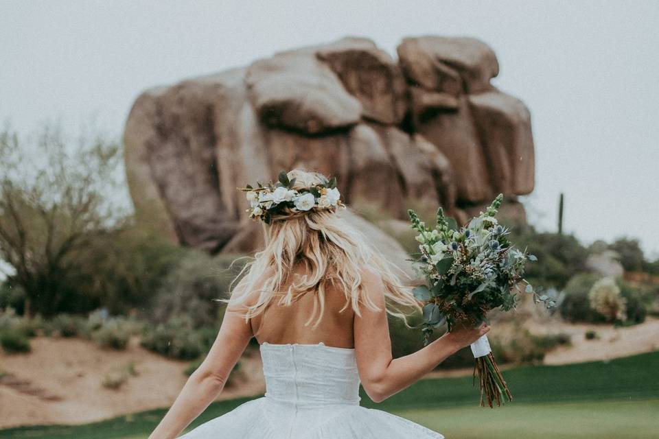 Happy bride with bouquet