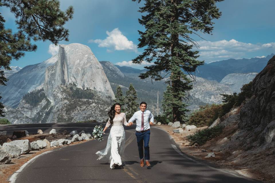 Groom carrying his bride