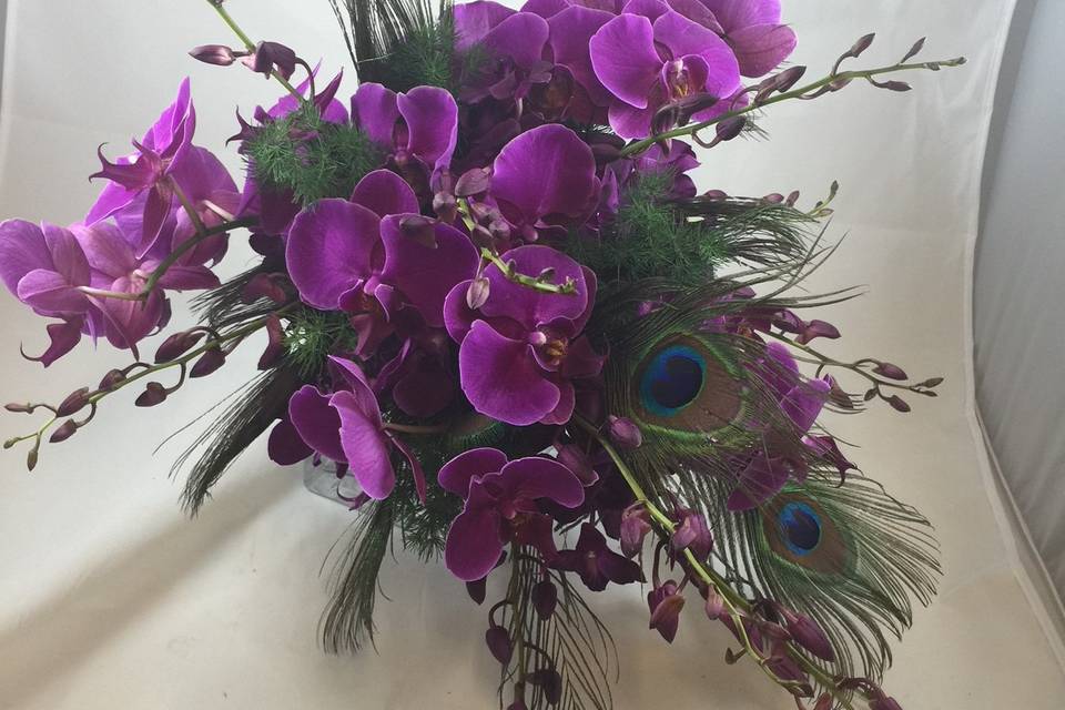 Orchid and peacock bouquet