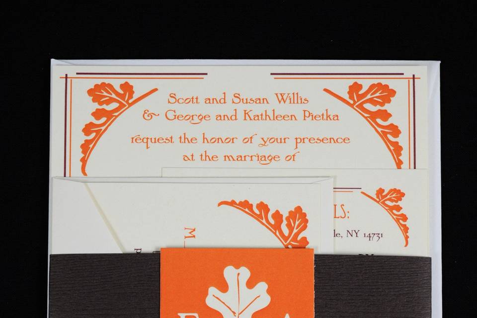 White, orange, and black wedding invite