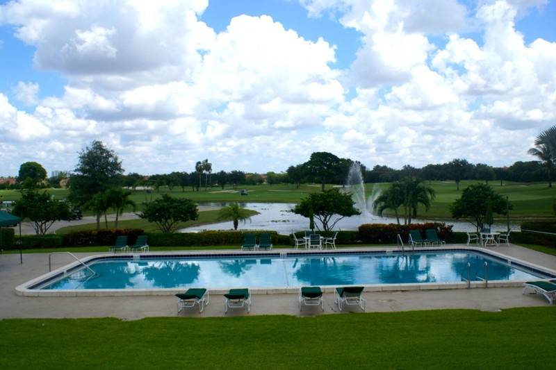 Beautiful view from event area overlooking the pool, fountain, and course
