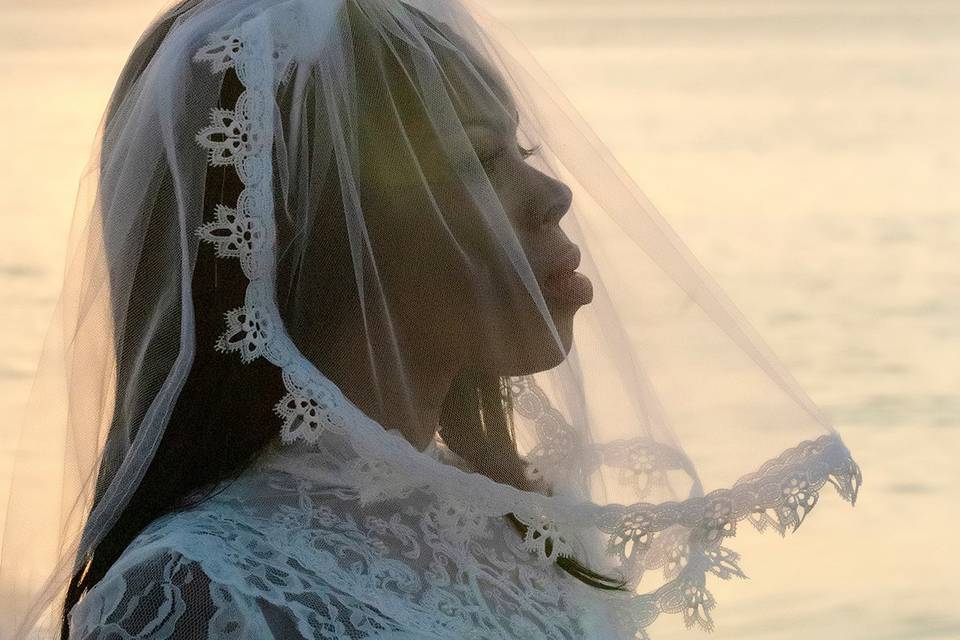 Bride looking into the sunrise