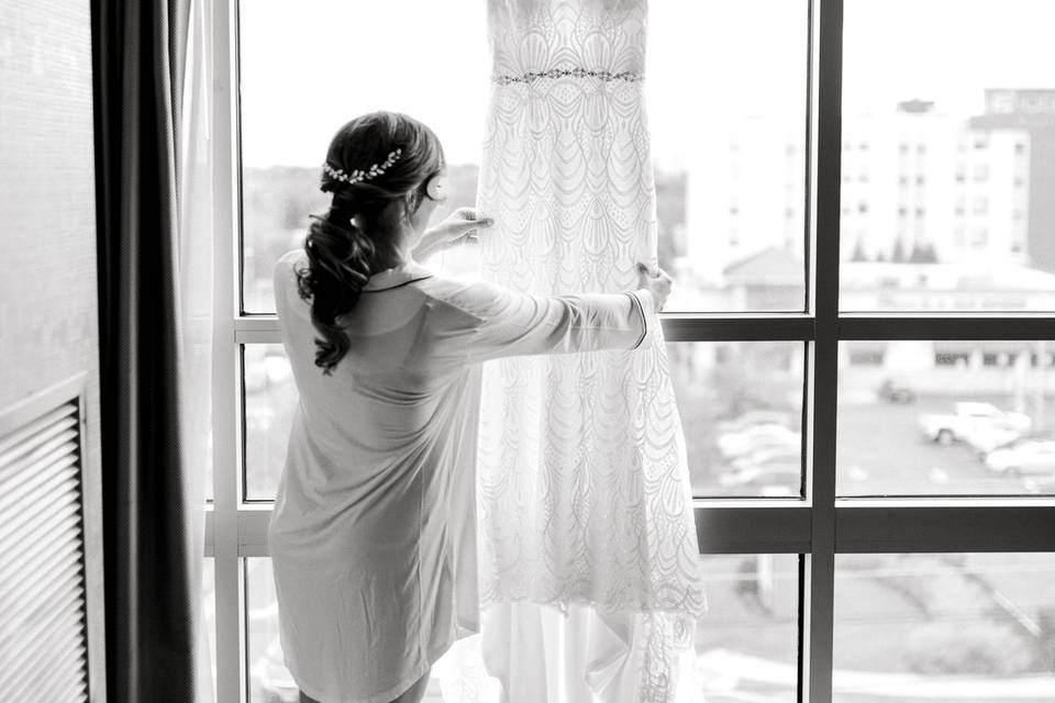 Bride looking at dress