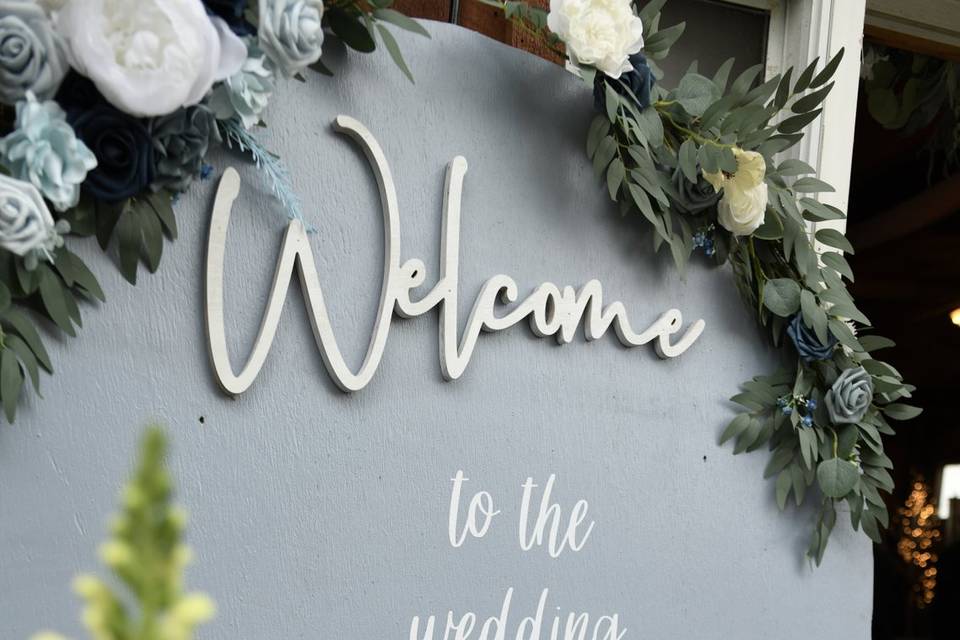 Welcome sign and live flowers!