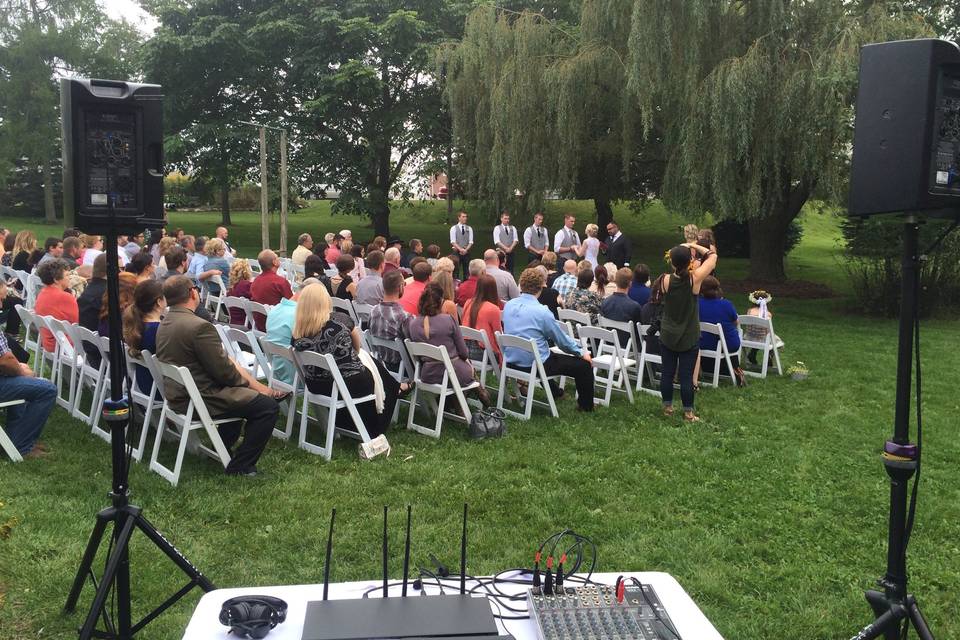 Sample setup for an outdoor ceremony. We use high quality audio equipment to ensure everything sounds perfect! We position ourselves off to the side so we do not show up in any photos. Seating music starts 30-45 minutes prior to the official start, and we play and monitor sound as needed once the nuptials begin!