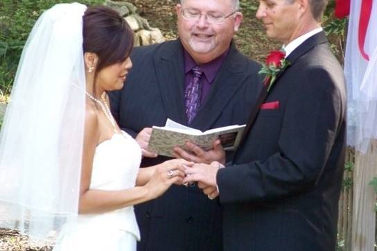 Couple exchanging rings