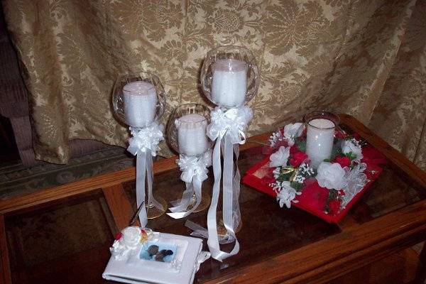 Goblets decorated to be used at head Table. Guest Book Covered personalized with a memory photo