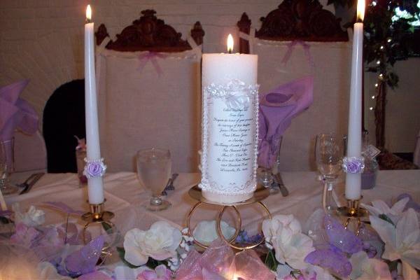 Here designed, with the invitation placed on the candle.