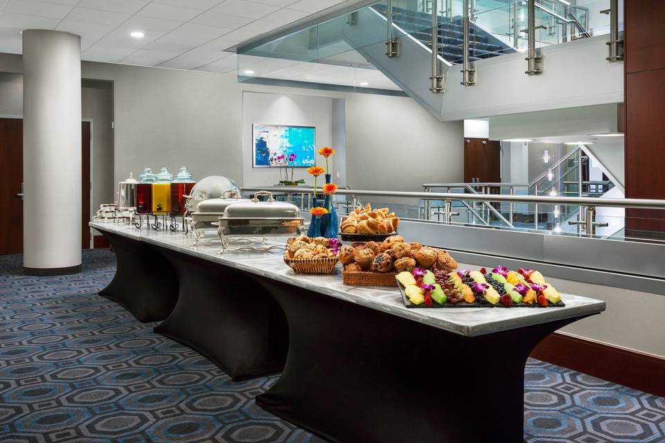 The newly renovated waterfront ballroom foyer with a brunch buffet. The perfect venue for a wedding reception, corporate event, sweet 16, rehearsal dinner, brunch, party or bridal luncheon