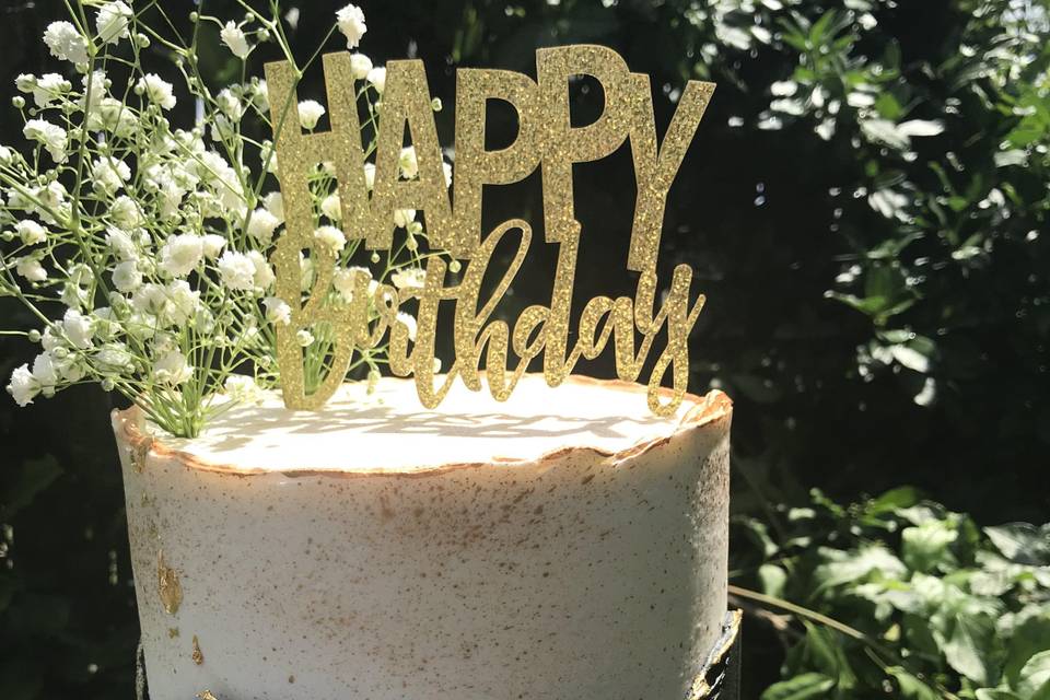 Custom birthday cake with fresh flowers