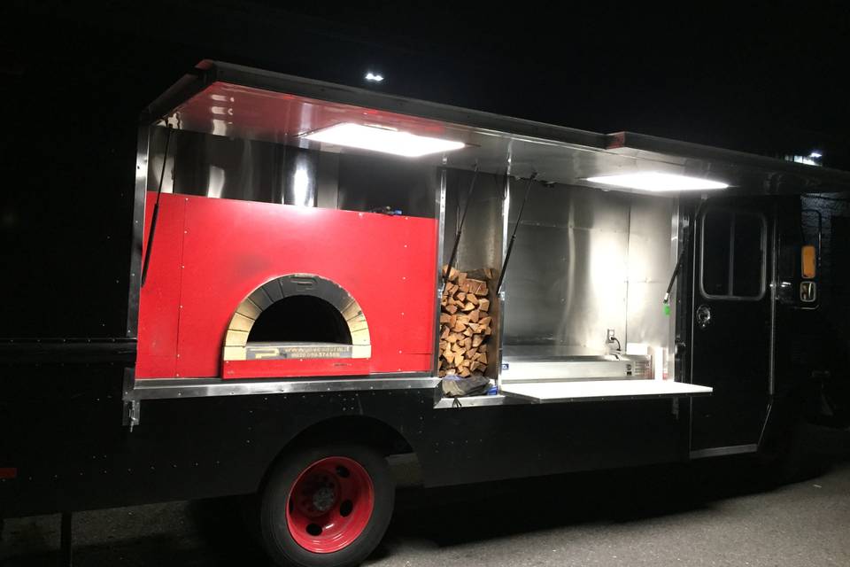Pizza truck at night