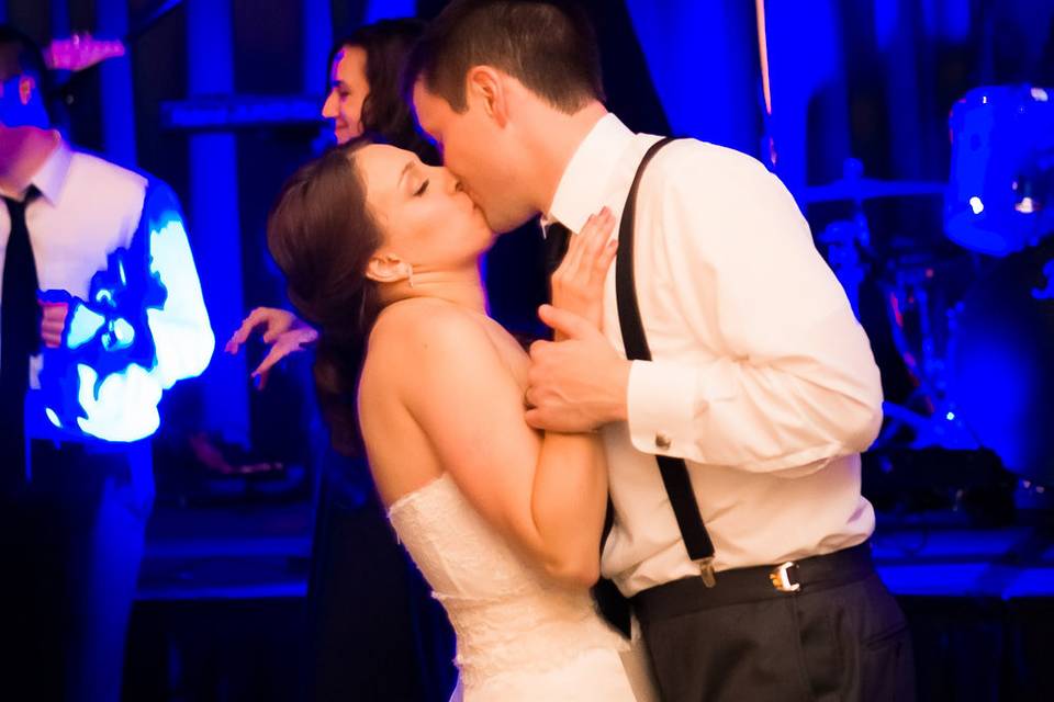 Newlyweds kissing