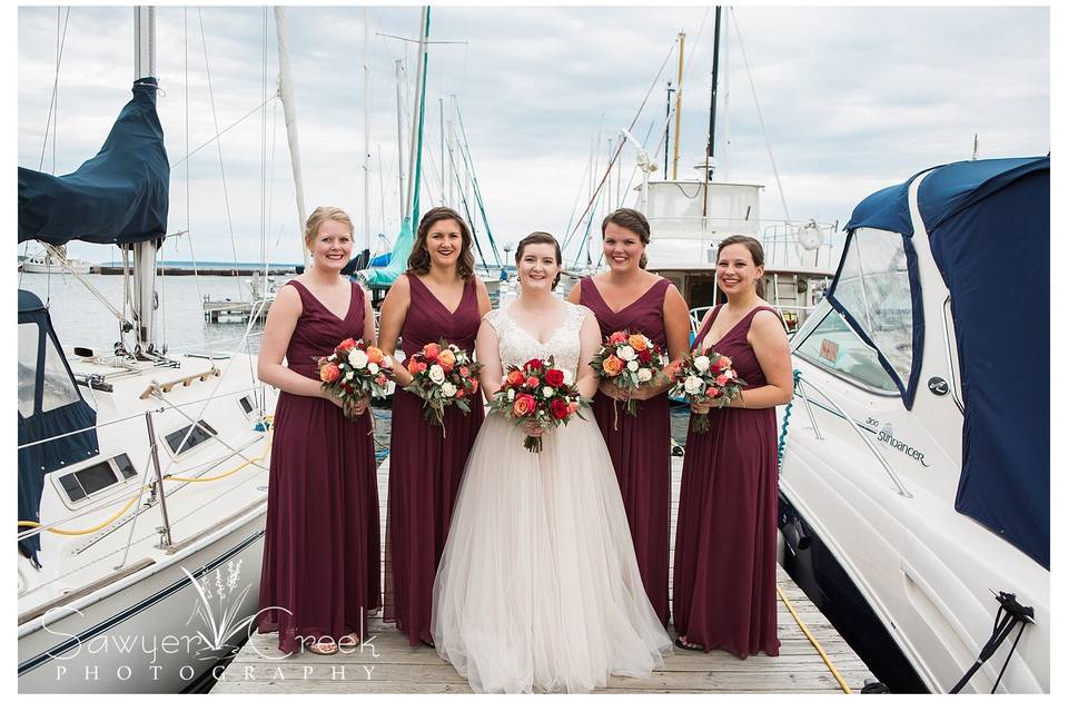 The wedding party on the dock
