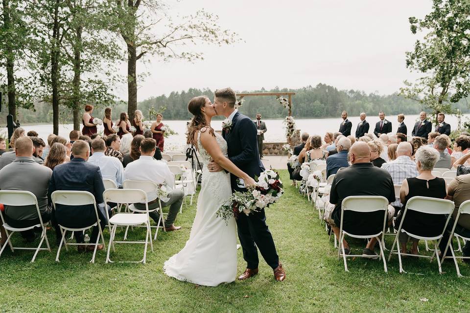 Kiss at the end of the aisle.
