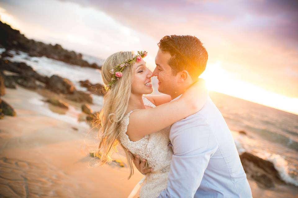Beautiful photo of the bride and groom at sunset taken by Maui wedding photographer Karma Hill Photography.
