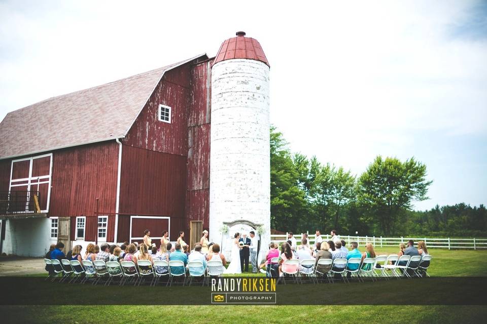 Outdoor ceremony by the old silo. (Photo courtesy of Randy Riksen)