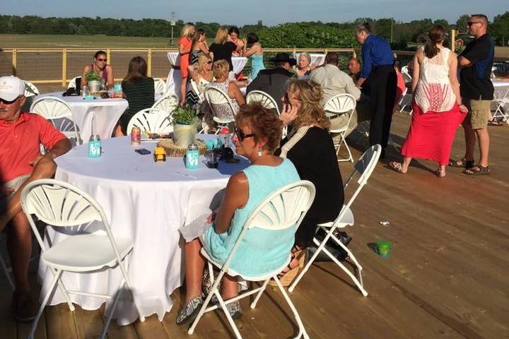 Guests enjoy the sunshine on our new wooden deck!