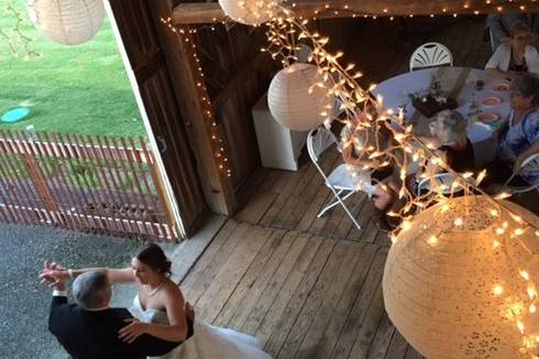 Father and daughter dance inside the barn!