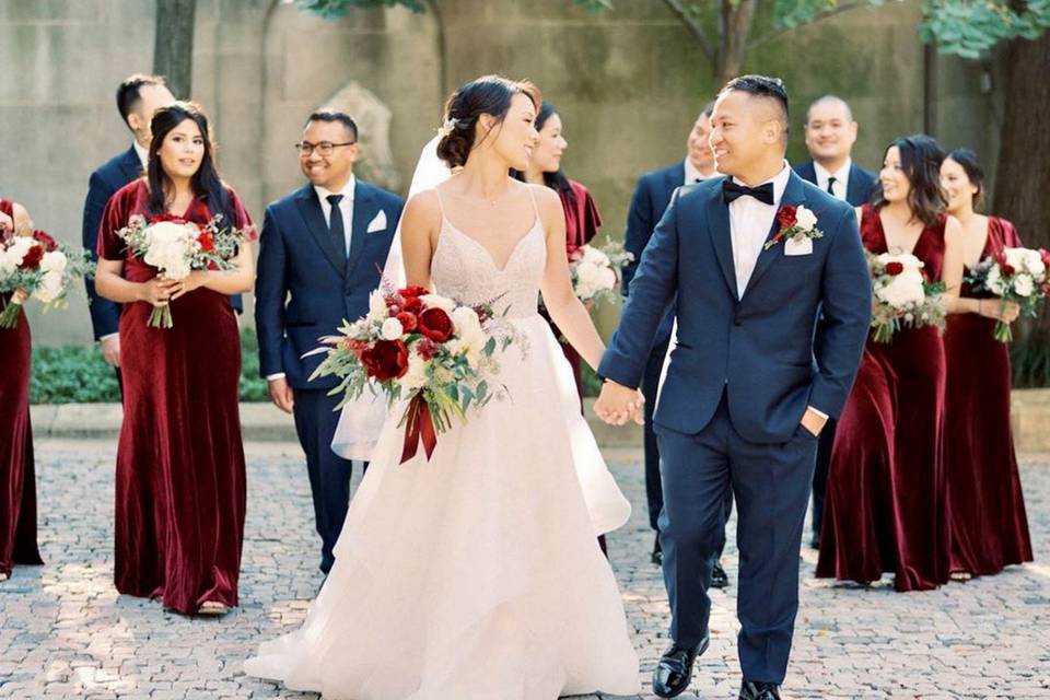Happy couple and wedding party