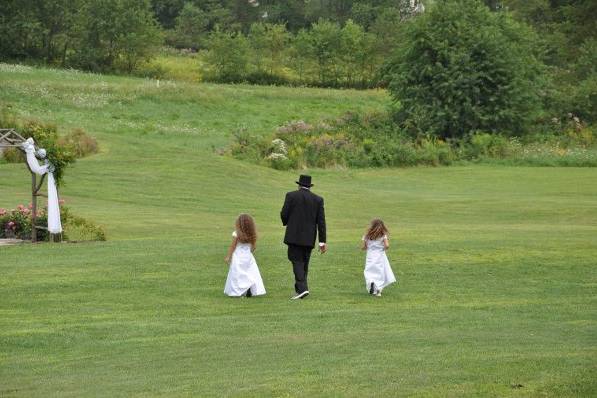 The groom and the kids at the wedding