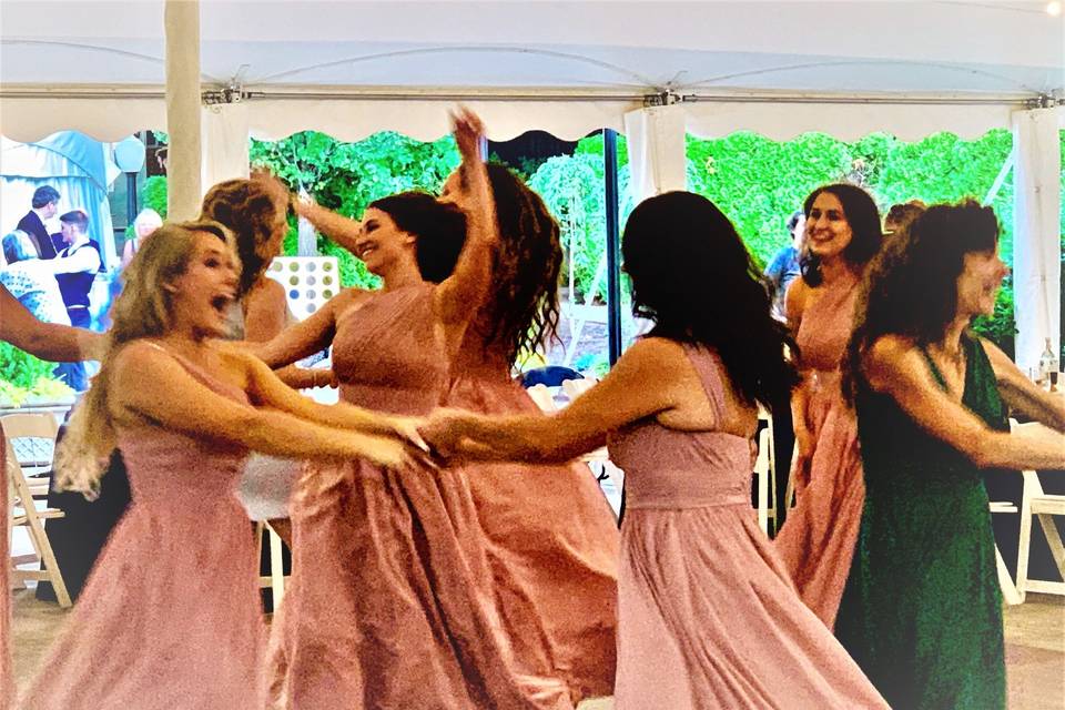 Bridesmaids celebrate moment