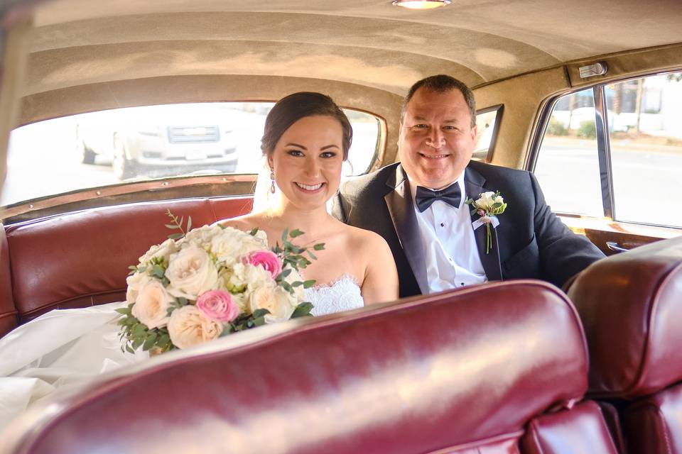 Bride and father in limo