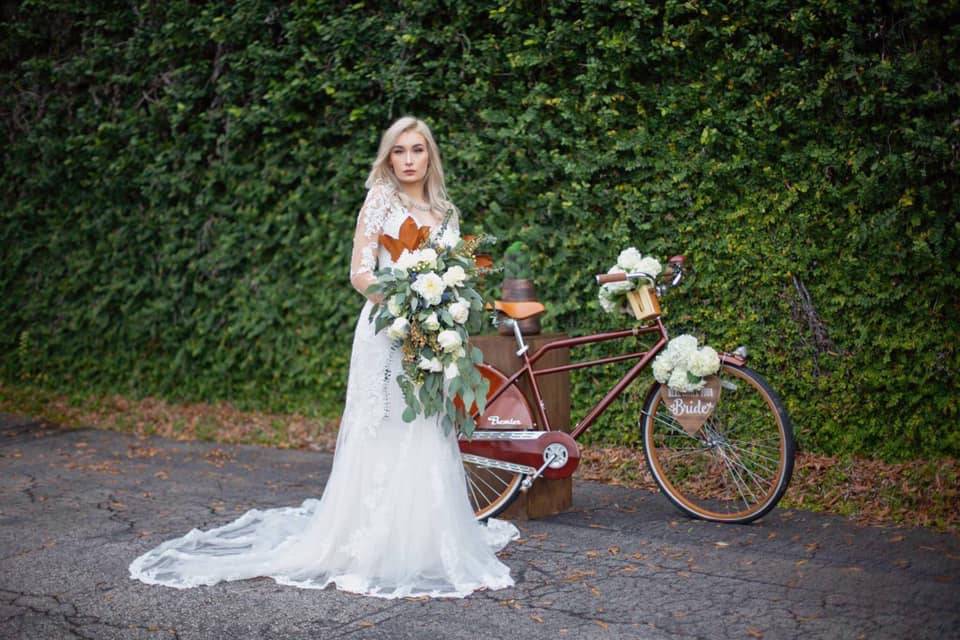 Bride by the bicycle