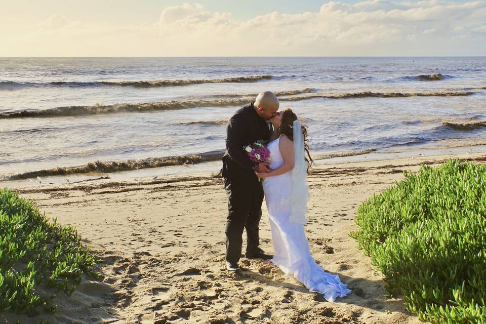 Newlyweds kissing