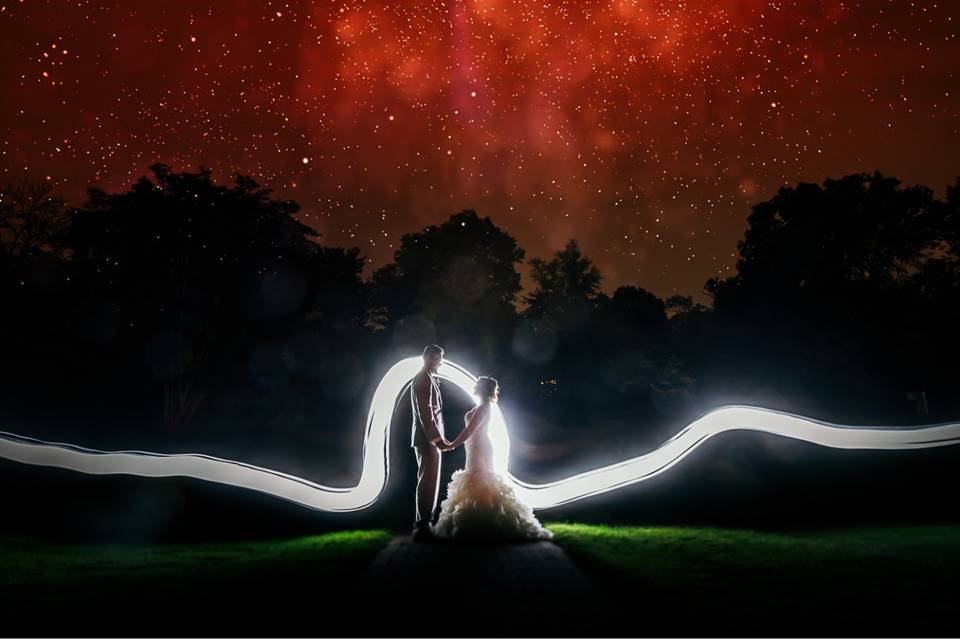 Artistic shot of couple beneath the stars