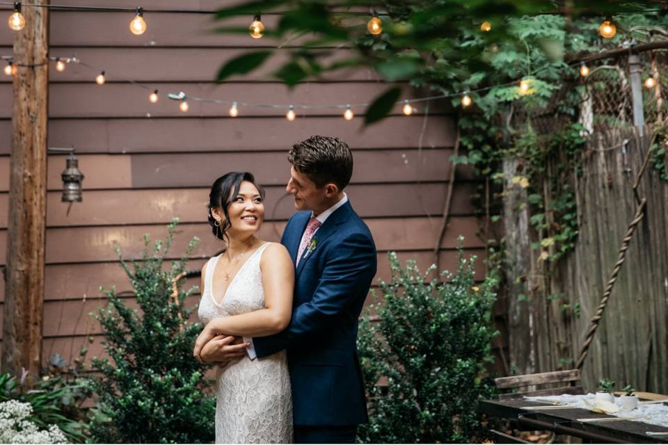 Couple embracing in garden