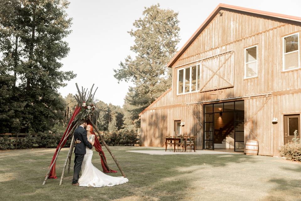 The barn in the background