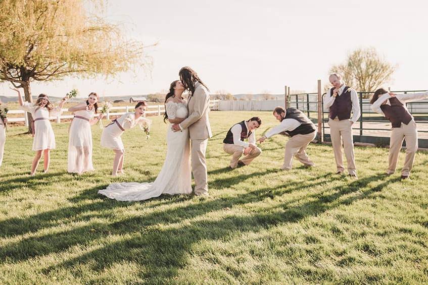 Wedding party pose on venue