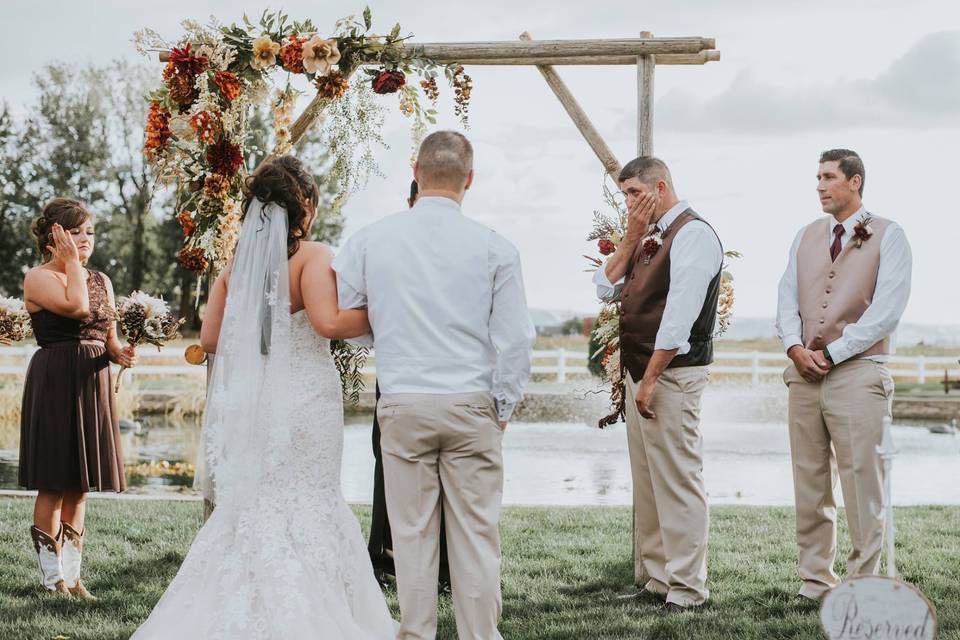 Vows under arch